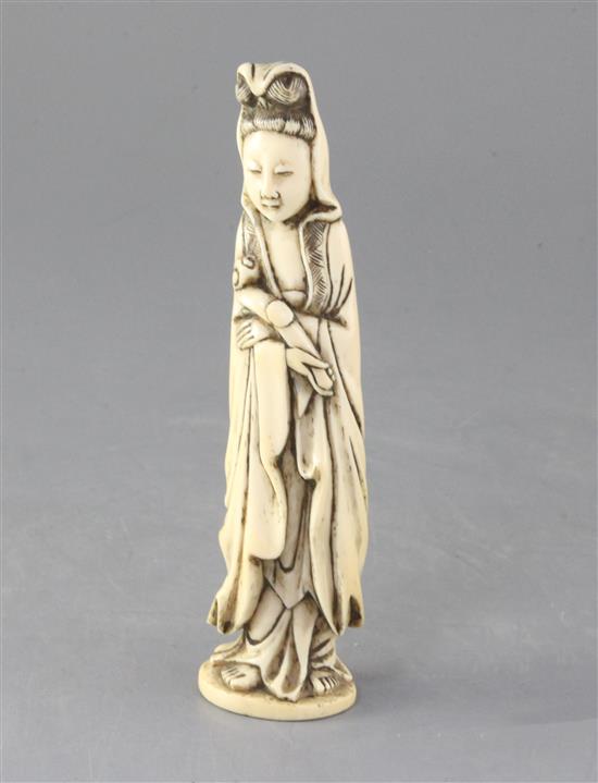 A Chinese walrus ivory figure of a Guanyin, 18th/19th century, height 17cm